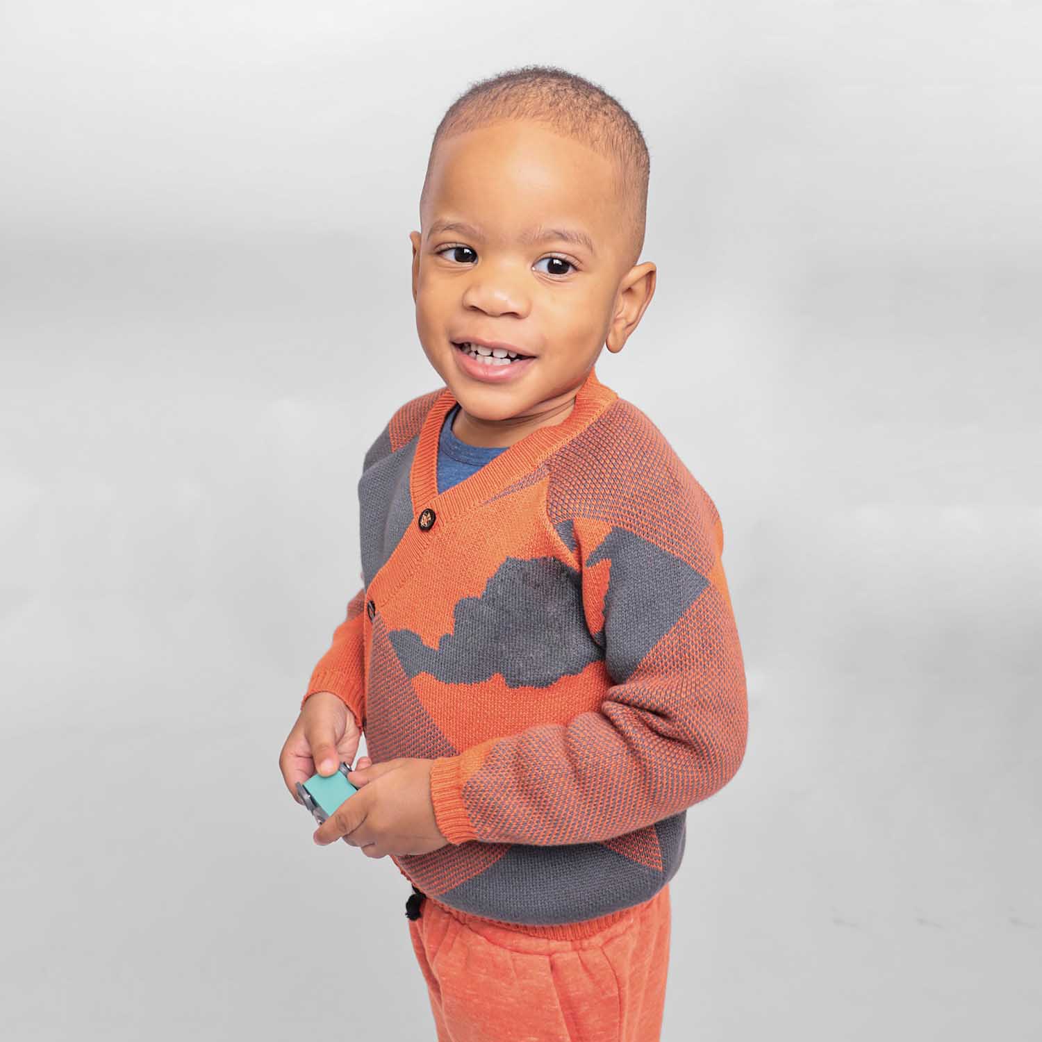 Baby Cardigan in Blue and Orange – view 2 – Infantium Victoria
